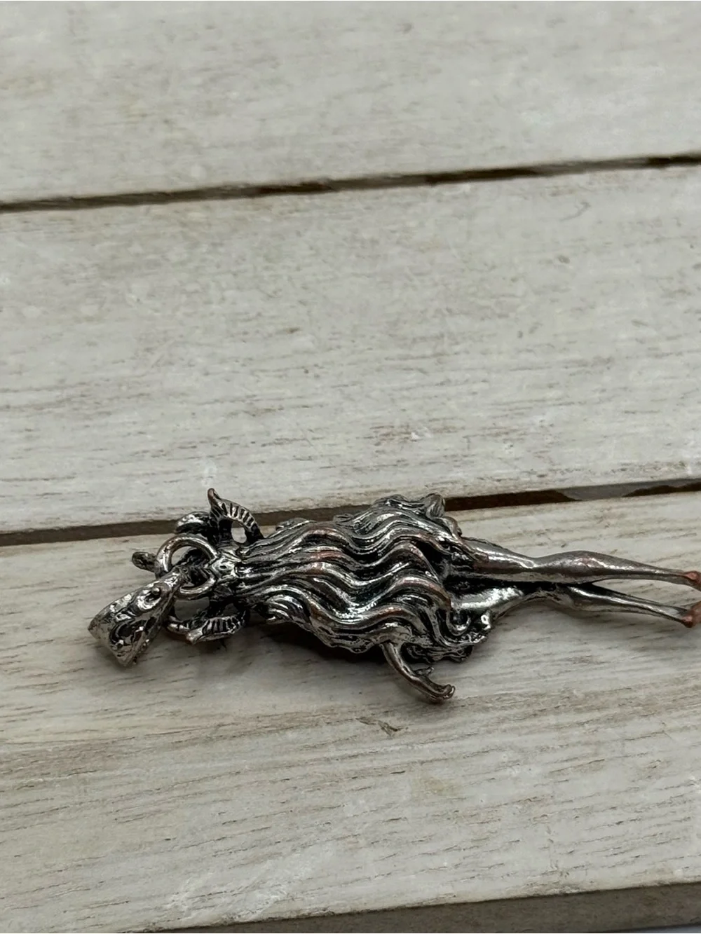 Silver-tone Mythical Creature Pendant Necklace Accent